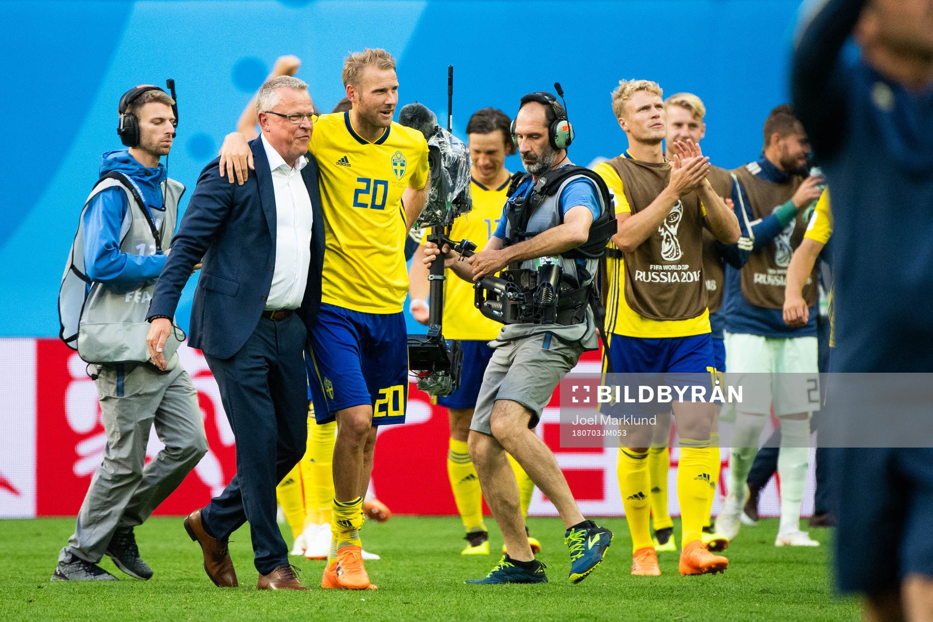 Head coach Janne Andersson and Ola Toivonen of Sweden celebrate after winning the FIFA World Cup round of 16 match between Sweden and Switzerland on July 3, 2018 in St Petersburg.