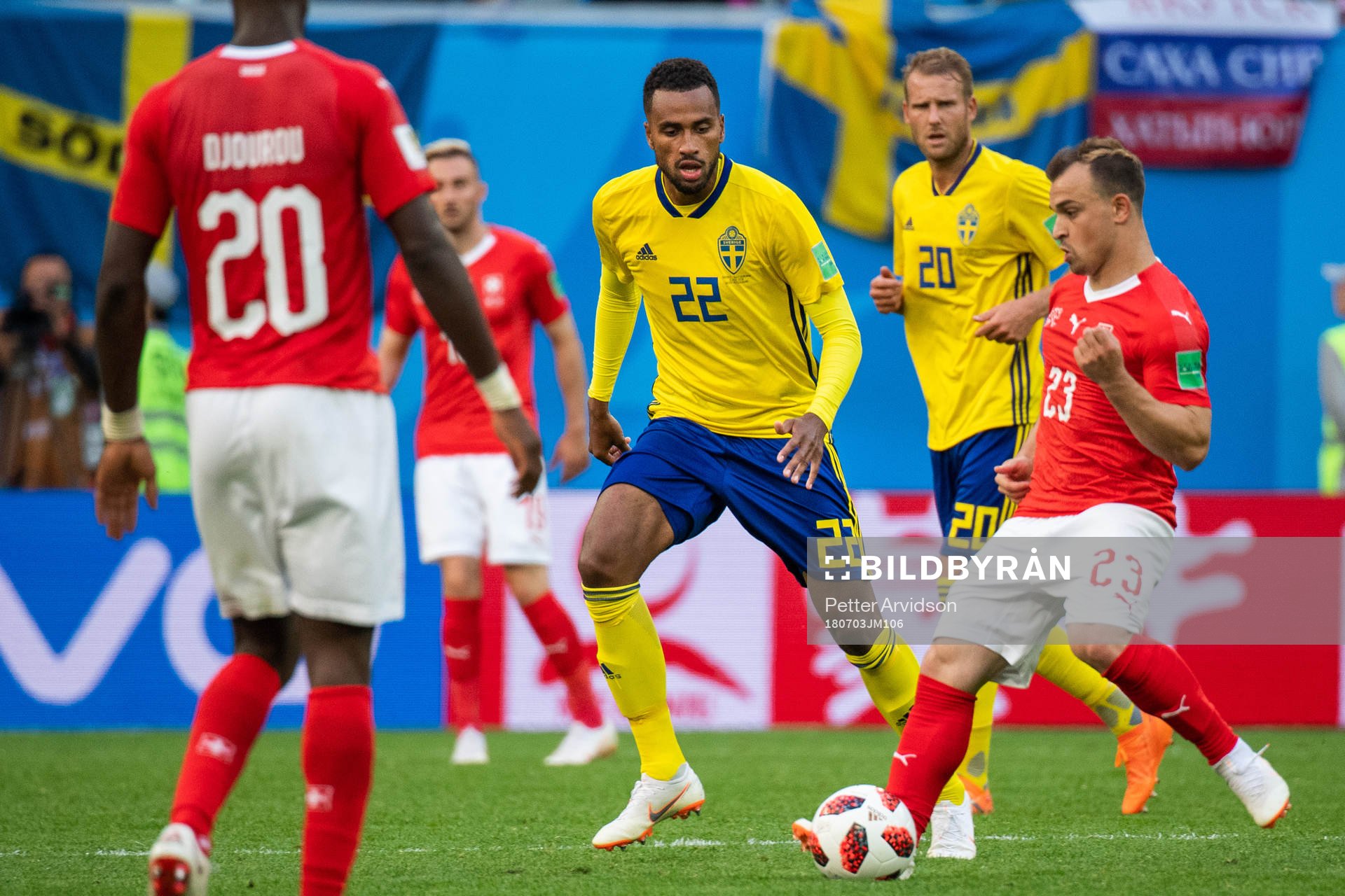 Isaac Kiese Thelin of Sweden and Xherdan Shaqiri of