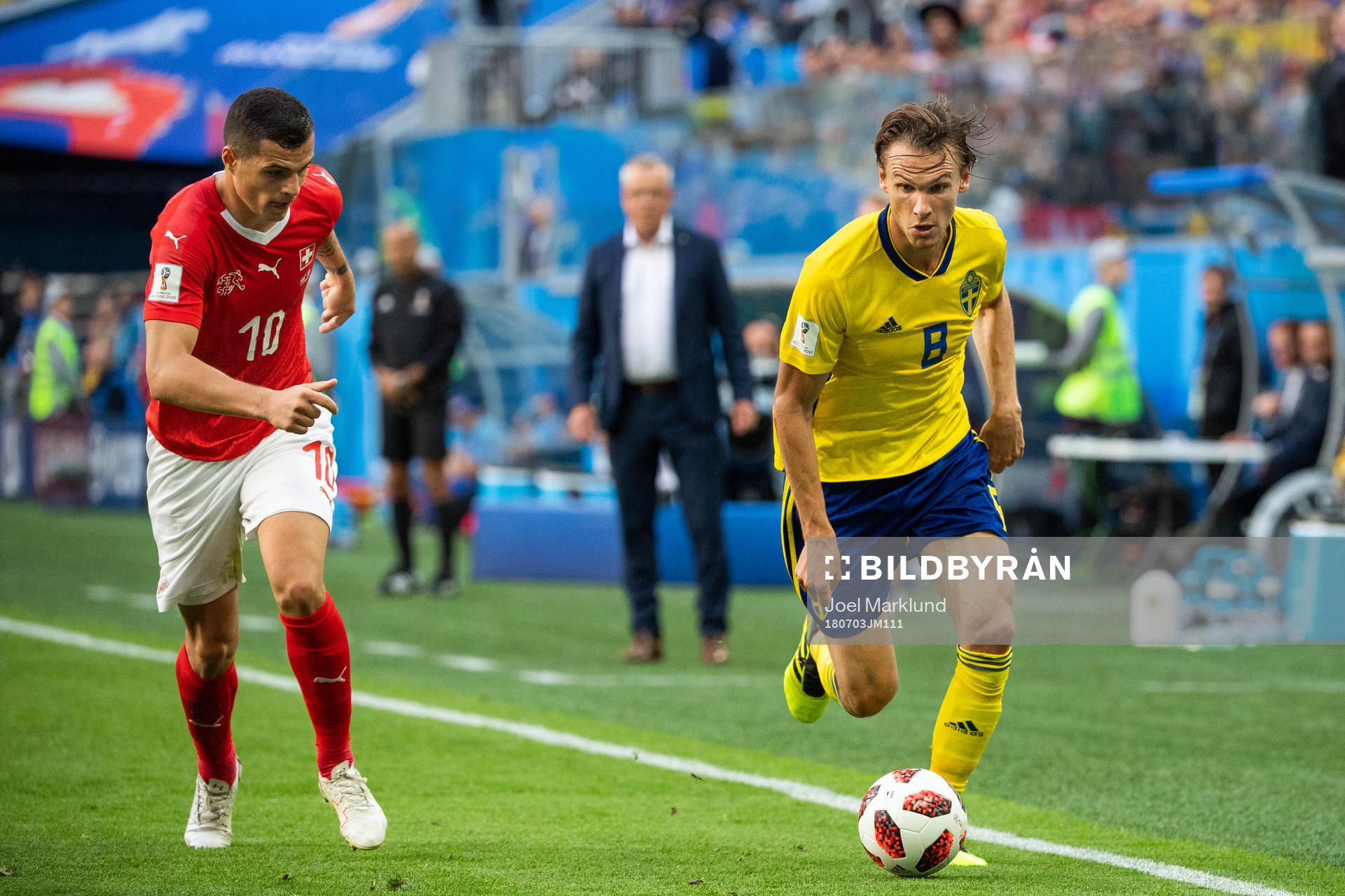 Granit Xhaka of Switzerland and Albin Ekdal of Sweden
