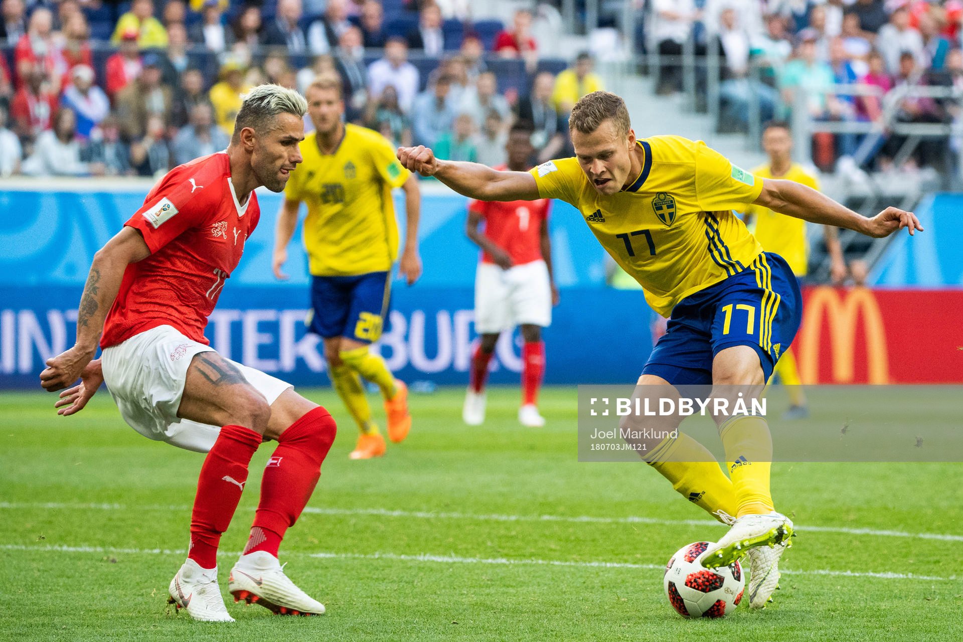 Valon Behrami of Switzerland and Viktor Claesson of Sweden
