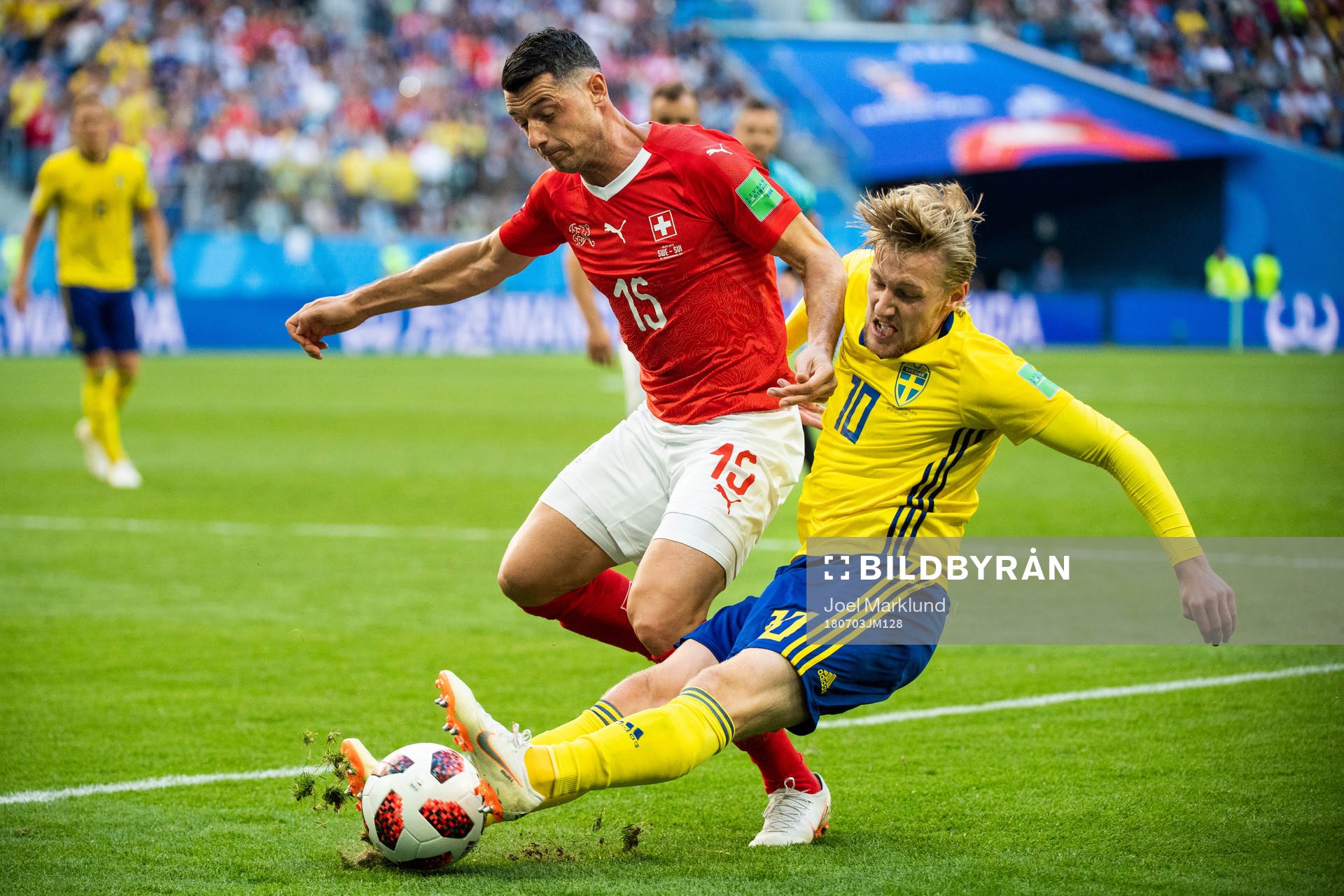 Blerim Dzemaili of Switzerland and Emil Forsberg of Sweden