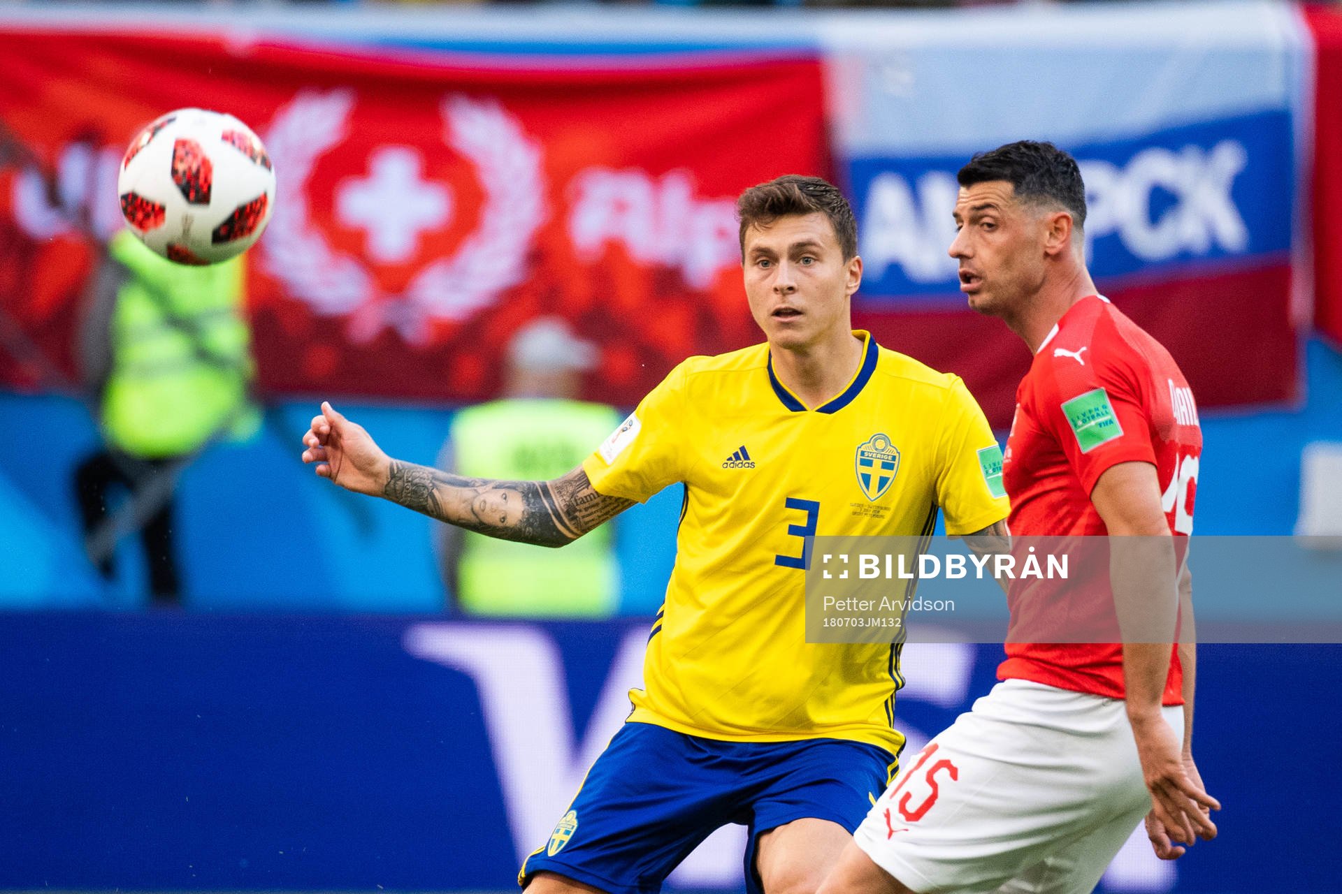 Victor Nilsson Lindelöf of Sweden and Blerim Dzemaili of