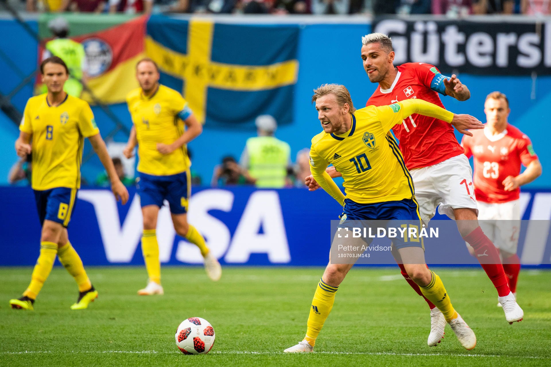 Emil Forsberg of Sweden and Blerim Dzemaili of Switzerland
