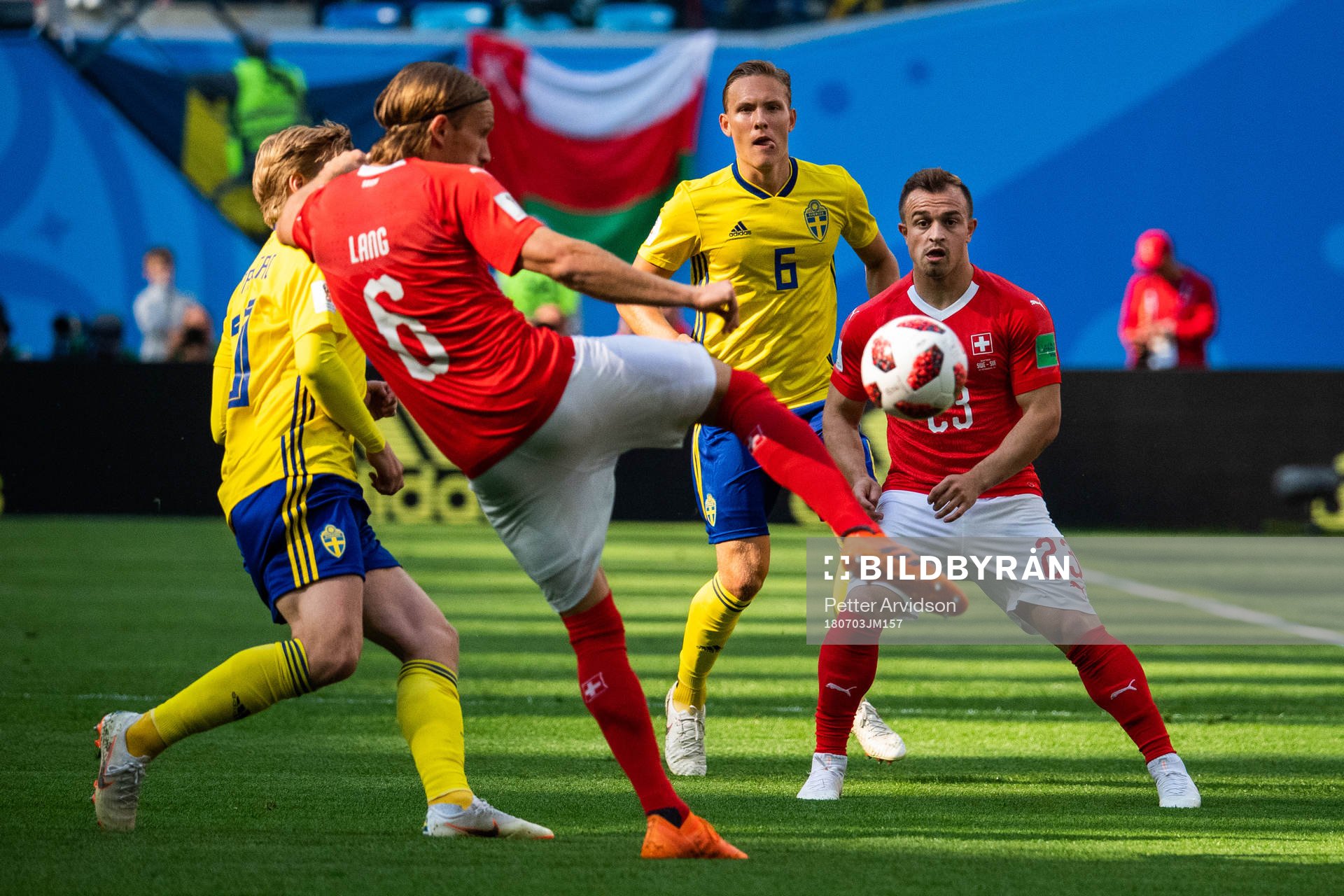 Ludwig Augustinsson of Sweden and Xherdan Shaqiri of