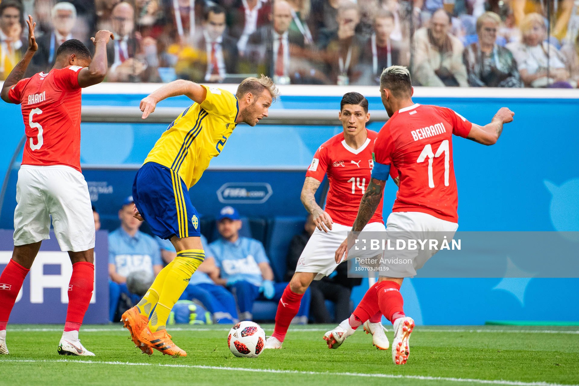Ola Toivonen of Sweden competes for the ball with Valon