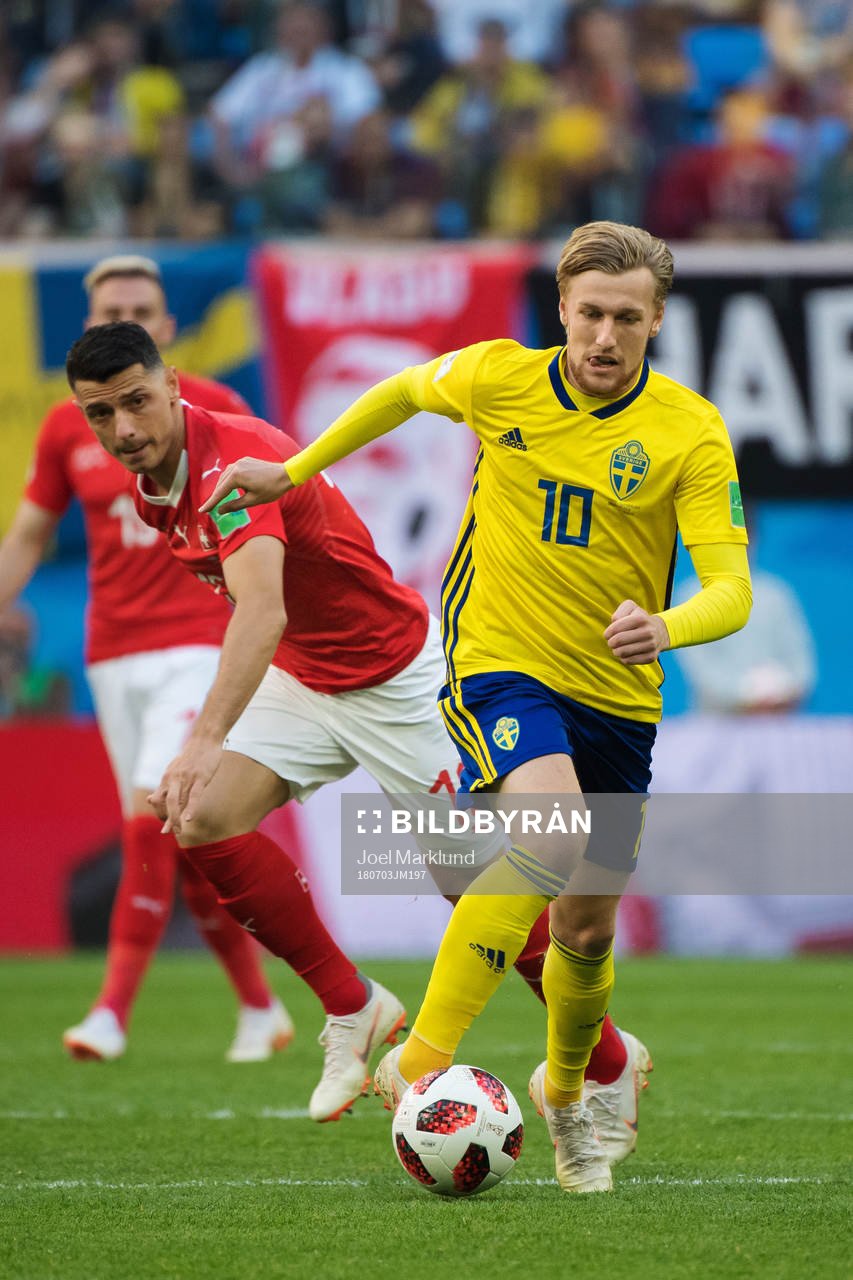 Blerim Dzemaili of Switzerland and Emil Forsberg of Sweden