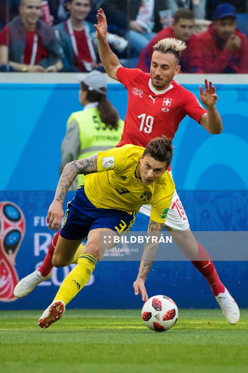 Victor Nilsson Lindelöf of Sweden and Josip Drmic of