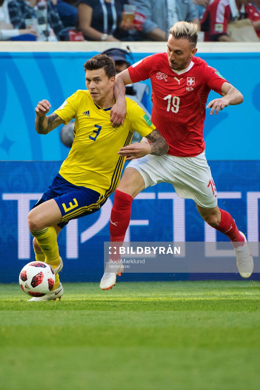 Victor Nilsson Lindelöf of Sweden and Josip Drmic of