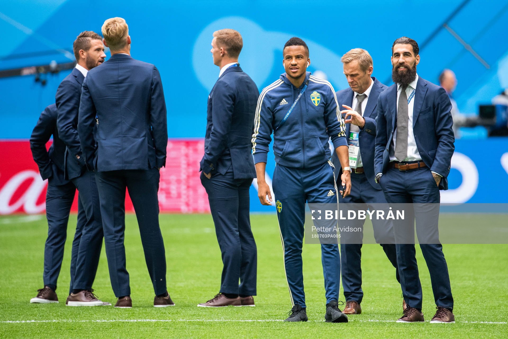 Martin Olsson and Jimmy Durmaz inspects the pitch prior to