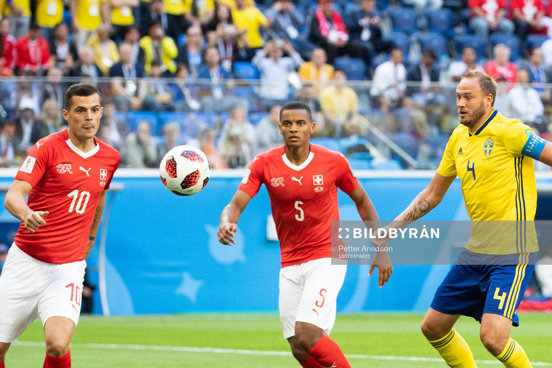 Granit Xhaka and Manuel Akanji competes for the ball with