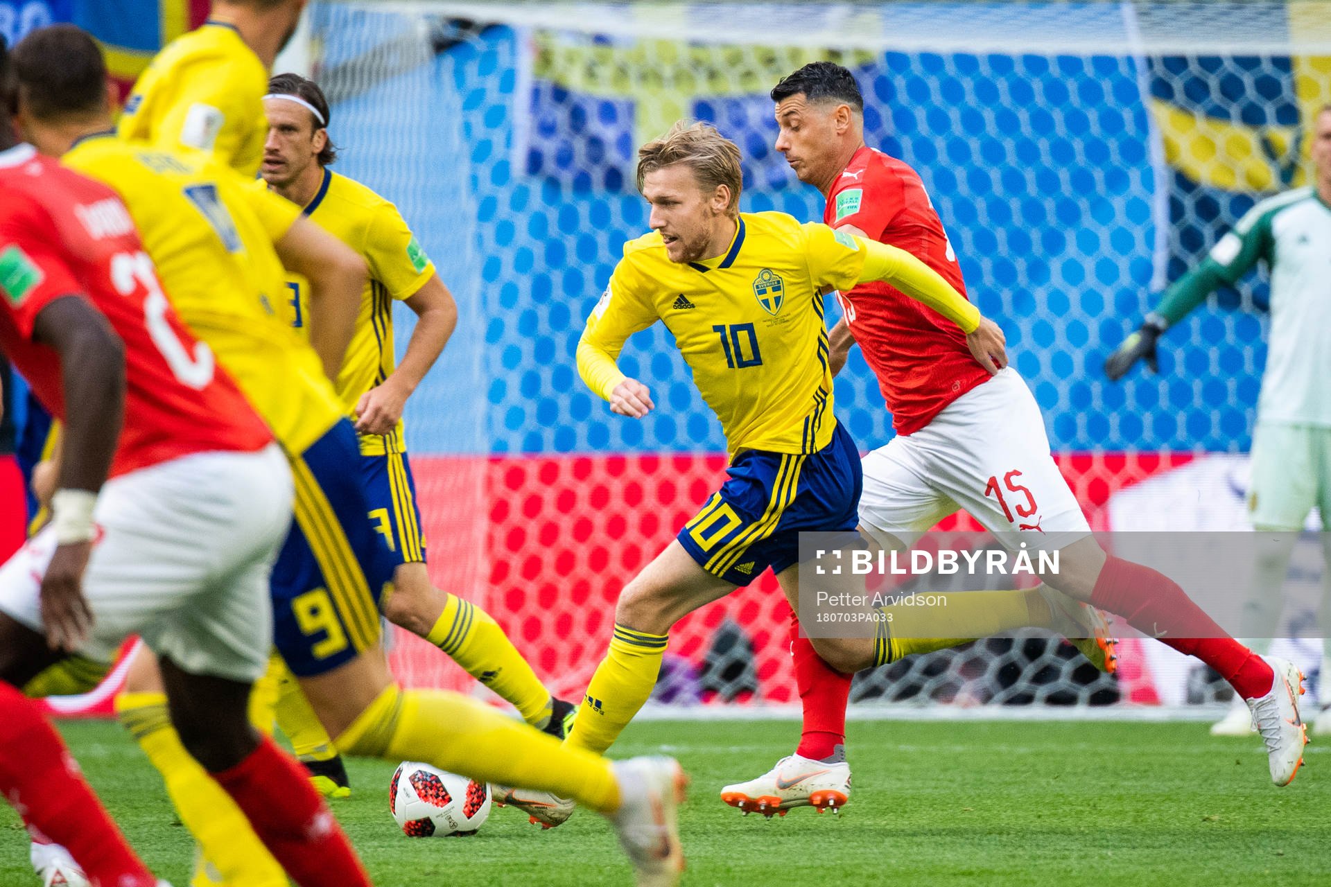 Emil Forsberg of Sweden competes for the ball with Blerim