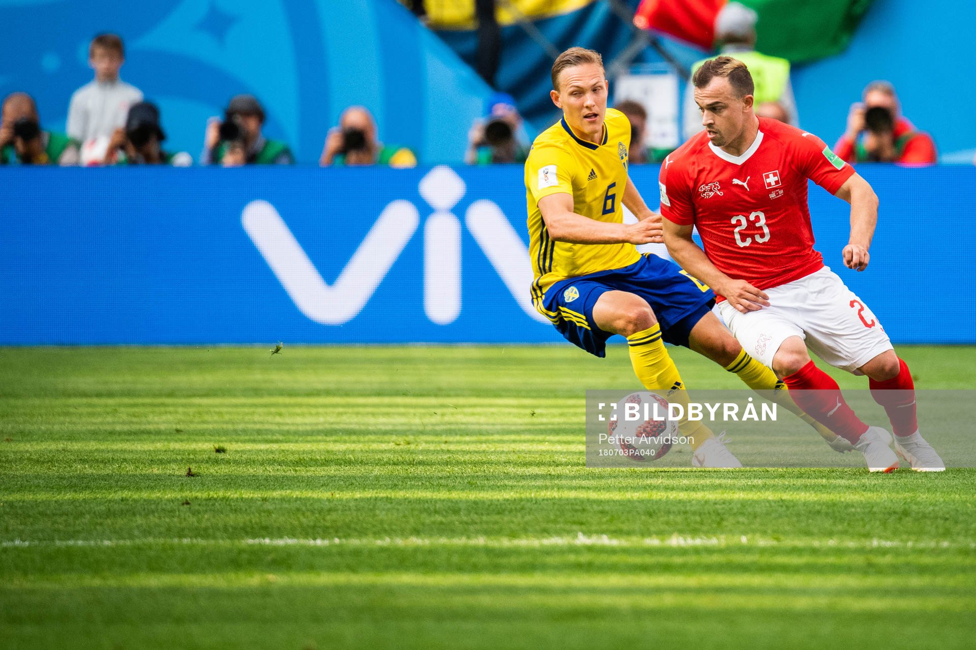 Ludwig Augustinsson of Sweden and Xherdan Shaqiri of