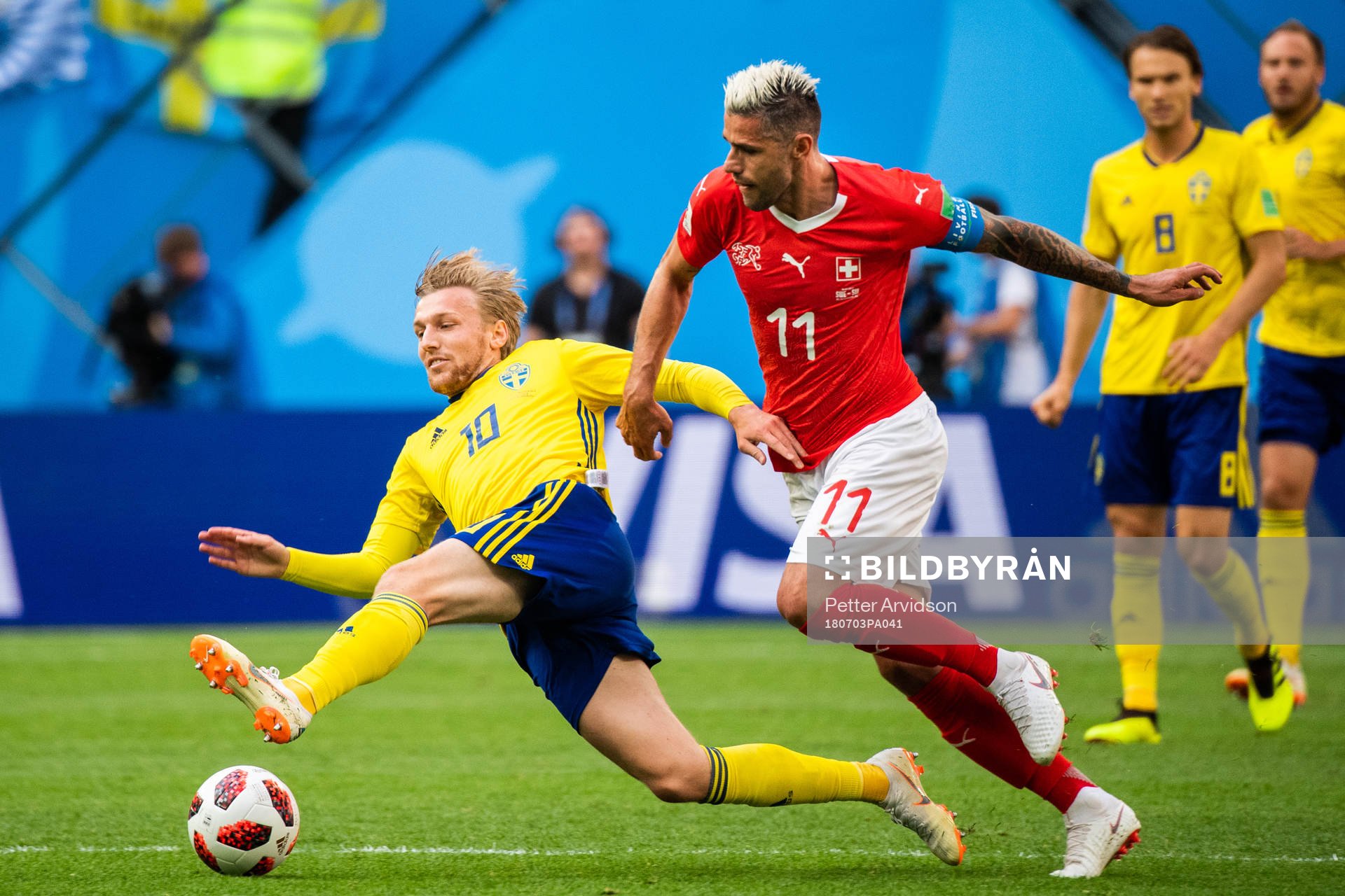 Emil Forsberg of Sweden competes for the ball with Valon