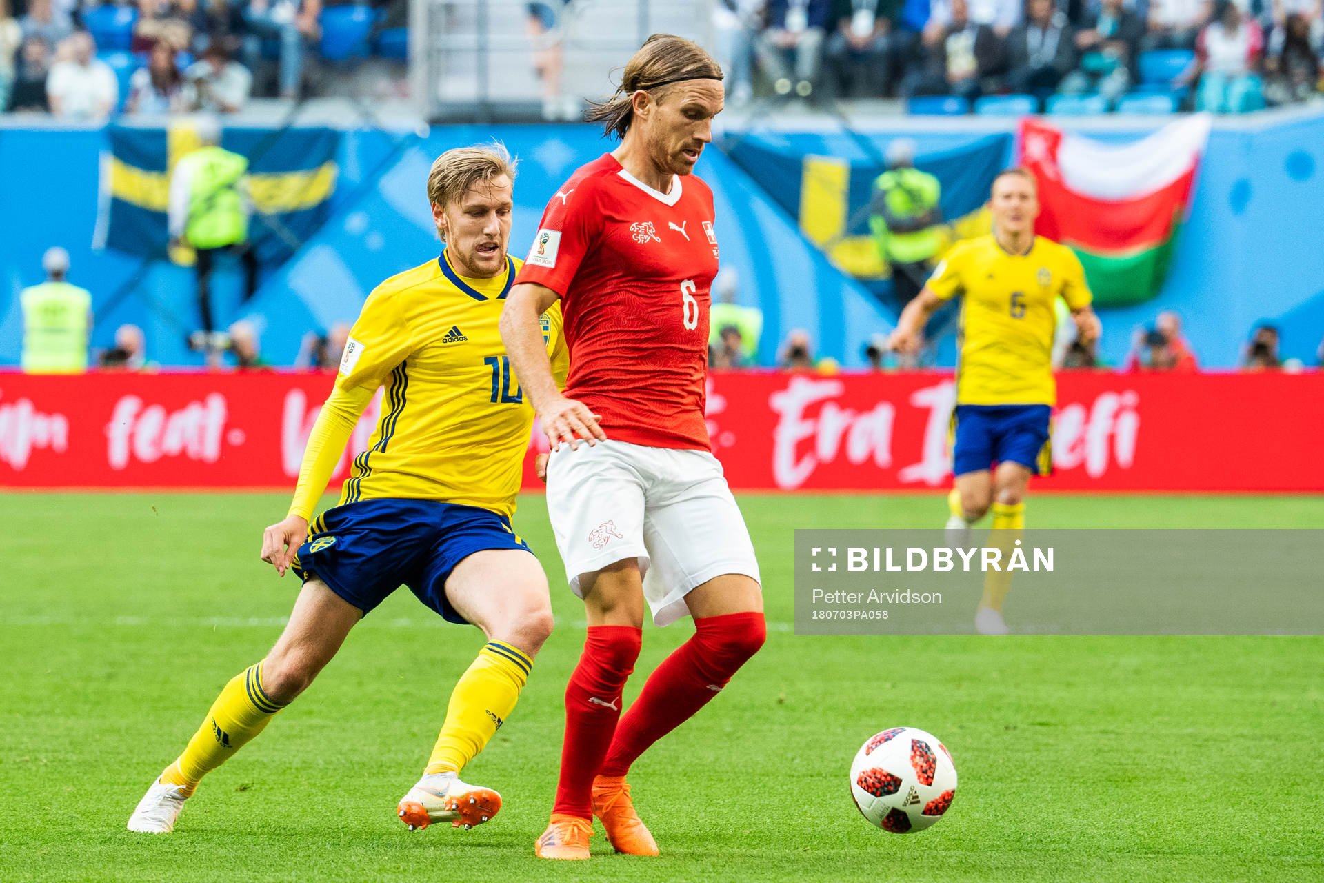 Michael Lang of Switzerland and Emil Forsberg of Sweden