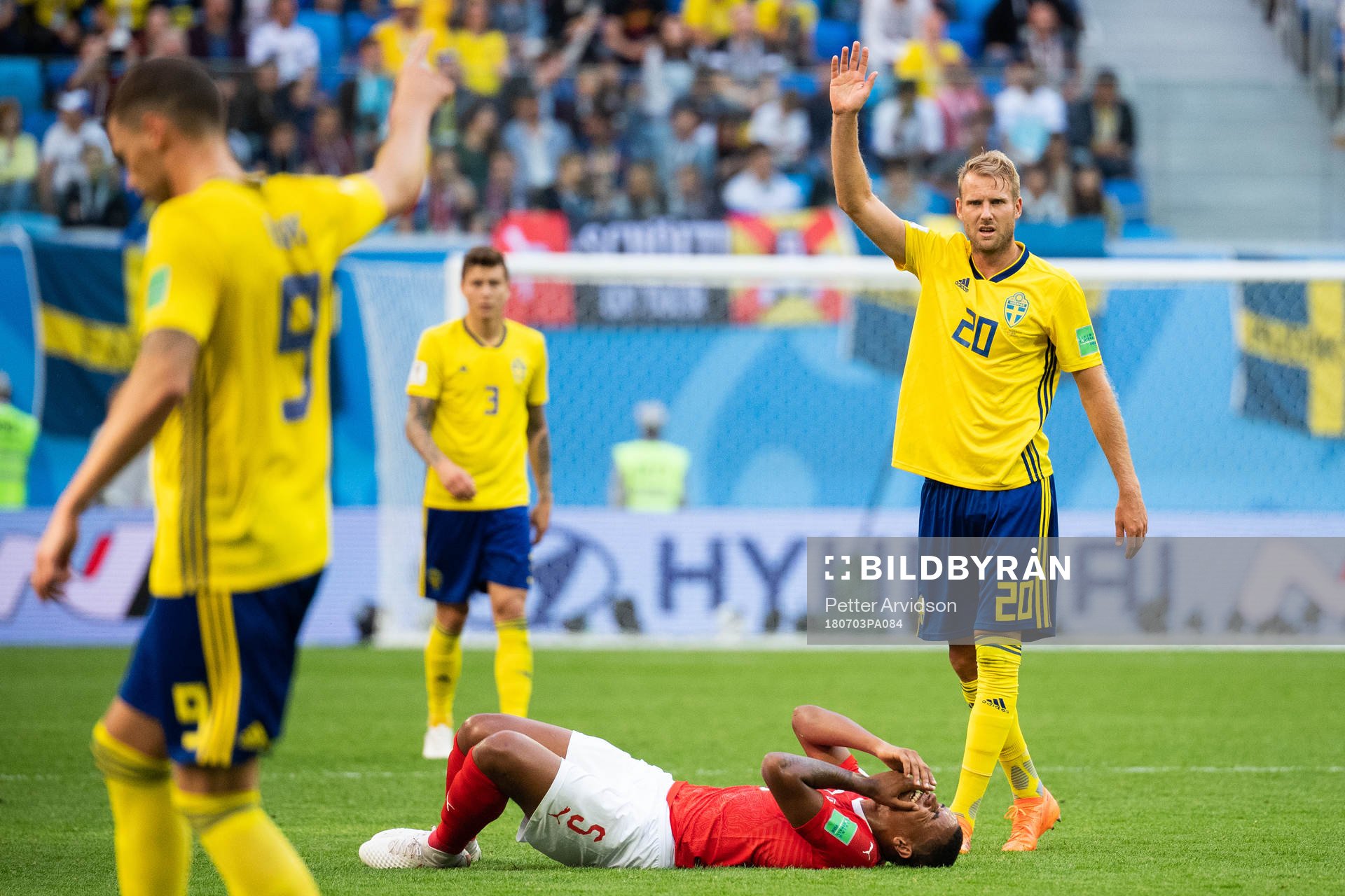Ola Toivonen of Sweden signals towards Marcus Berg to play