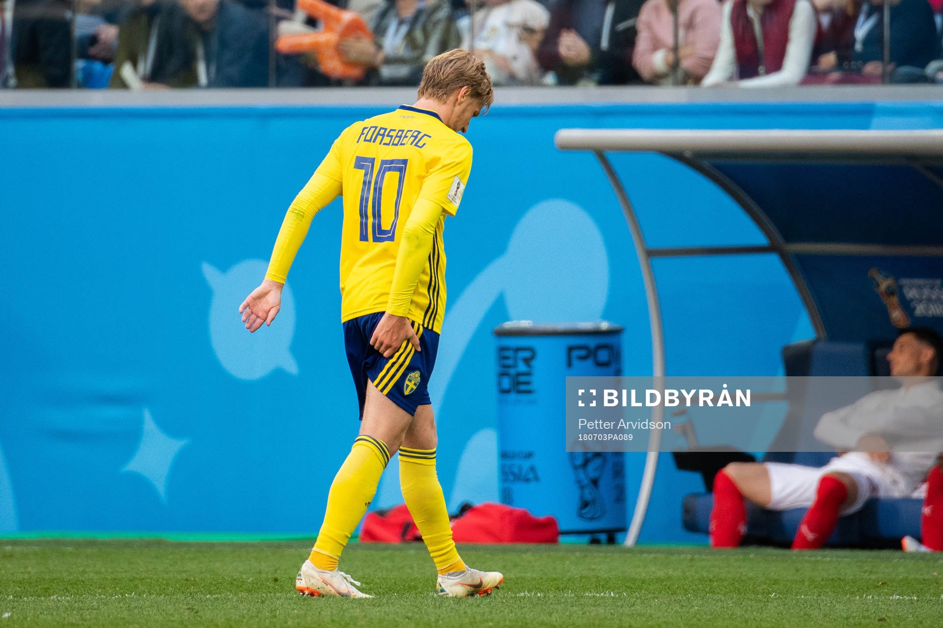 Emil Forsberg reaches for the backside of his thigh as he