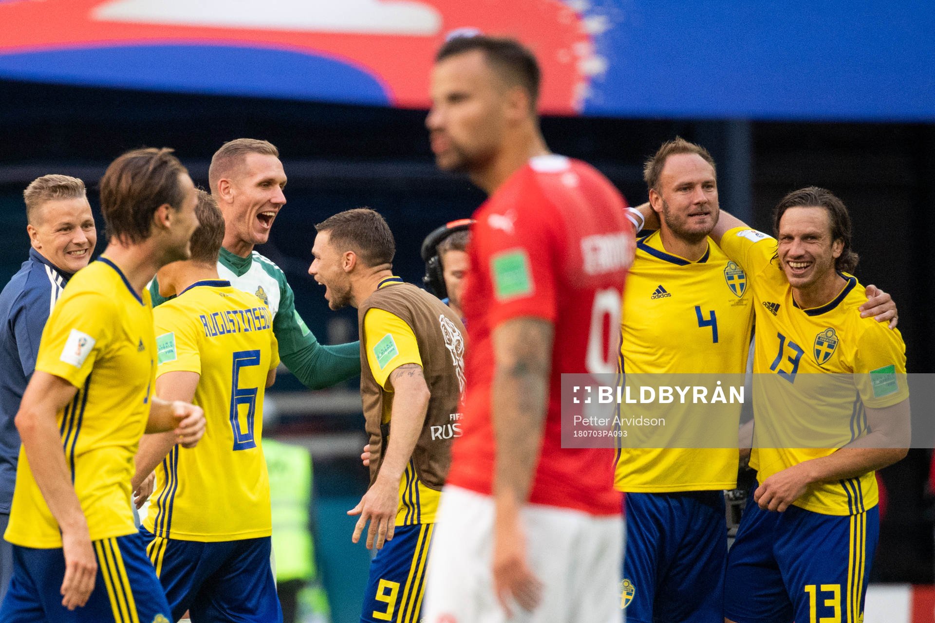 goalkeeper Robin Olsen and Marcus Berg of Sweden celebrates