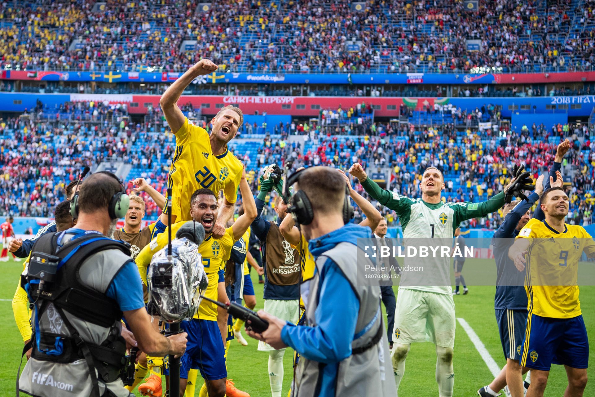 Ola Toivonen and Isaac Kiese Thelin of Sweden celebrate