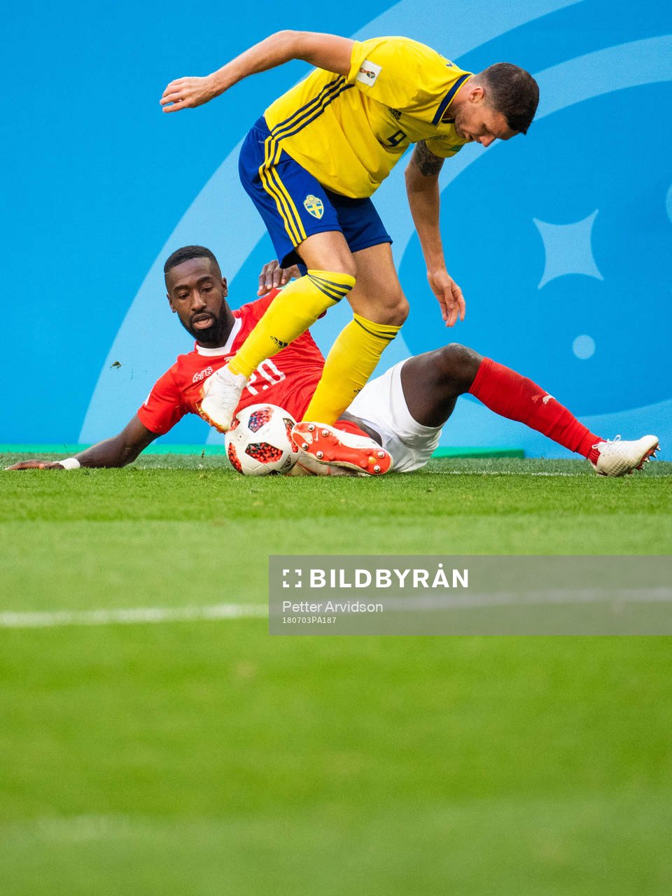 Johan Djourou of Switzerland competes for the ball with