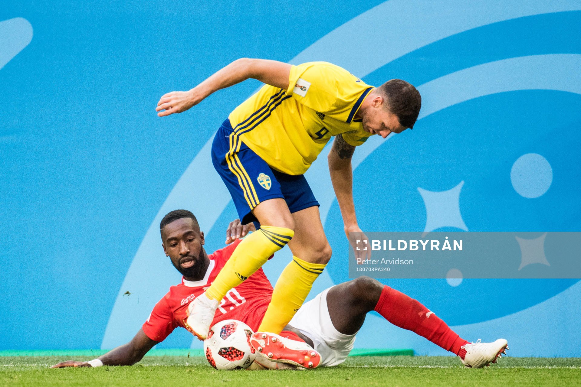 Marcus Berg of Sweden and Johan Djourou of Switzerland