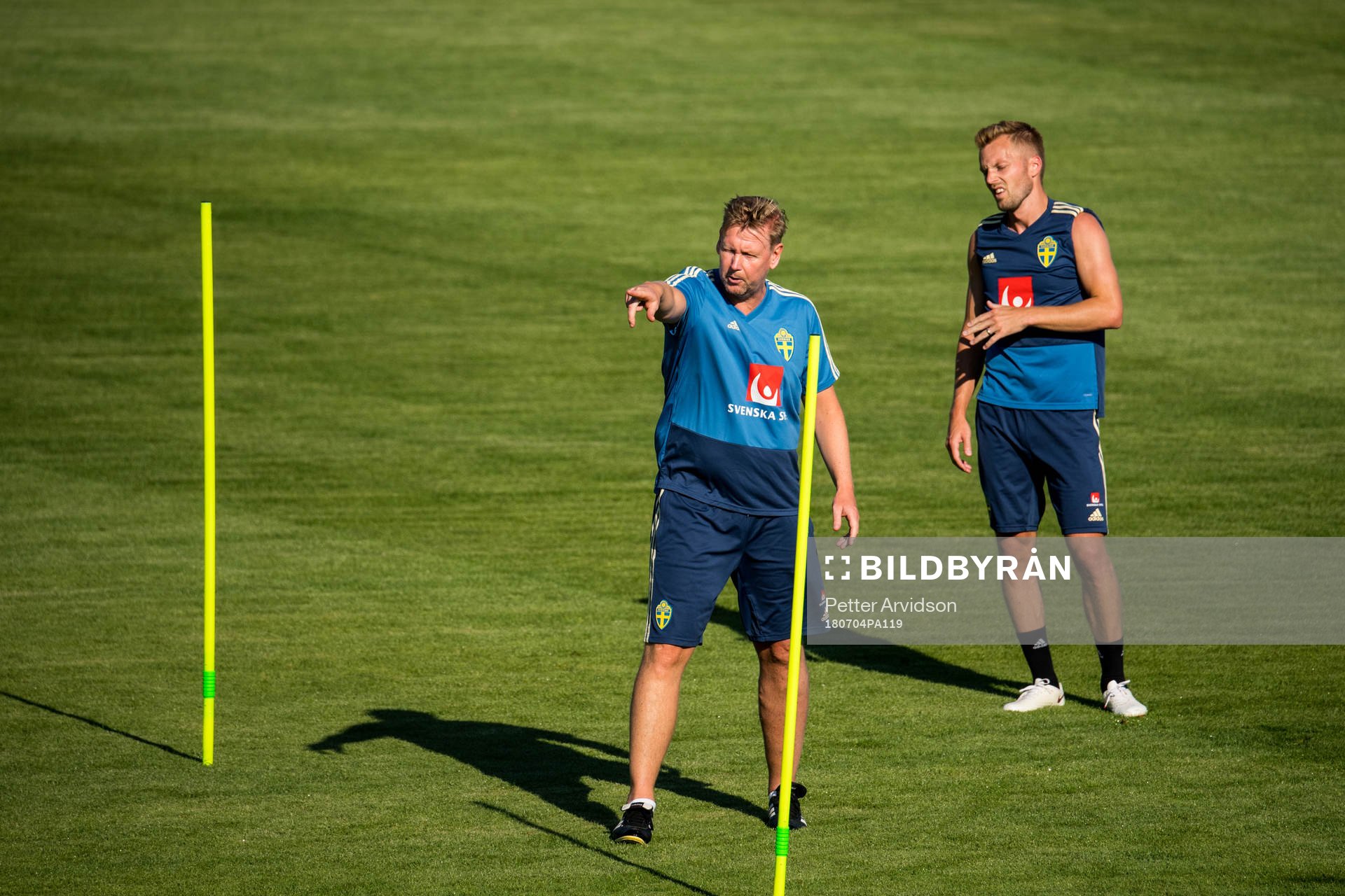 Assistant coach Peter Wettergren and Sebastian Larsson of