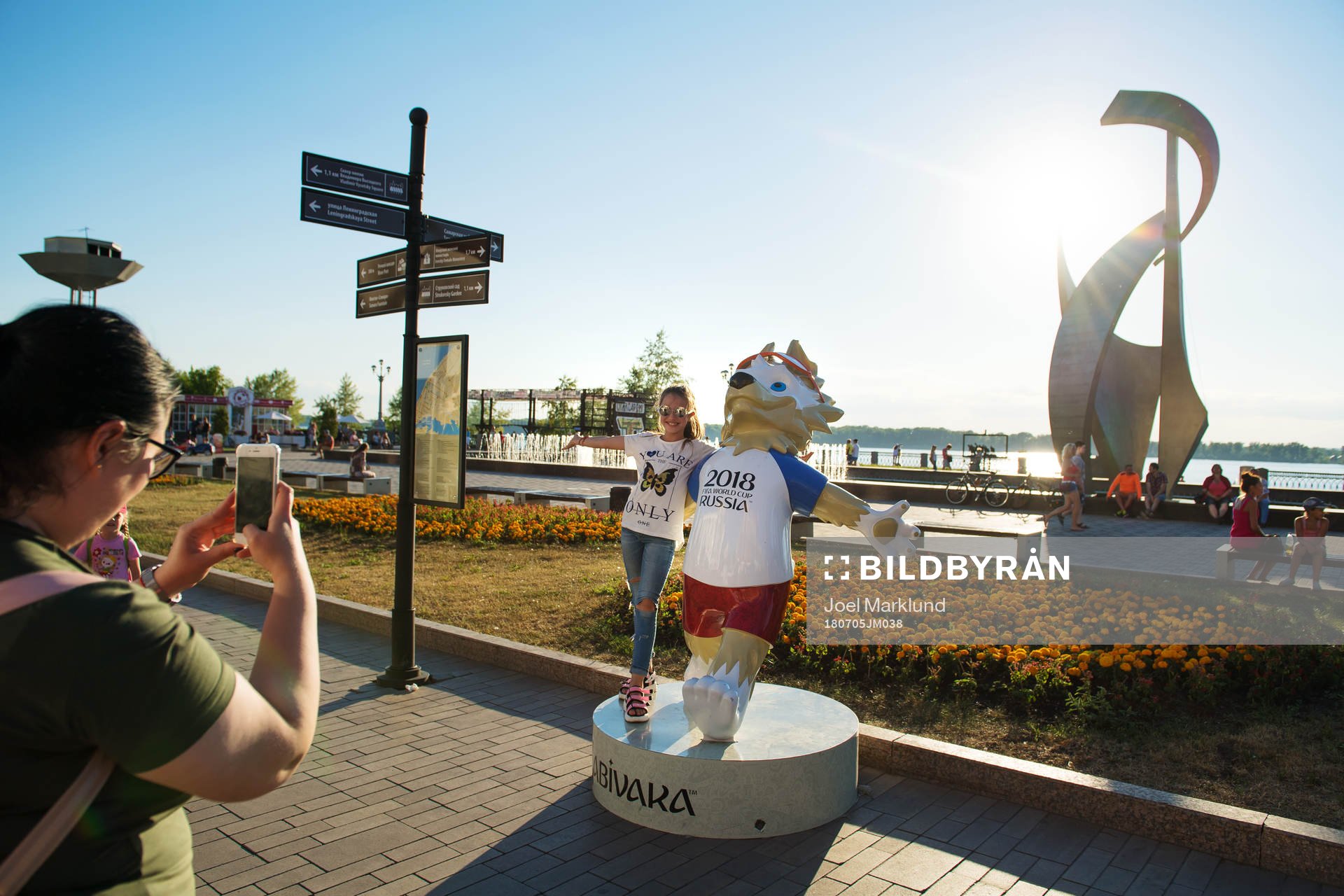 People take images in front of the FIFA 2018 World Cup