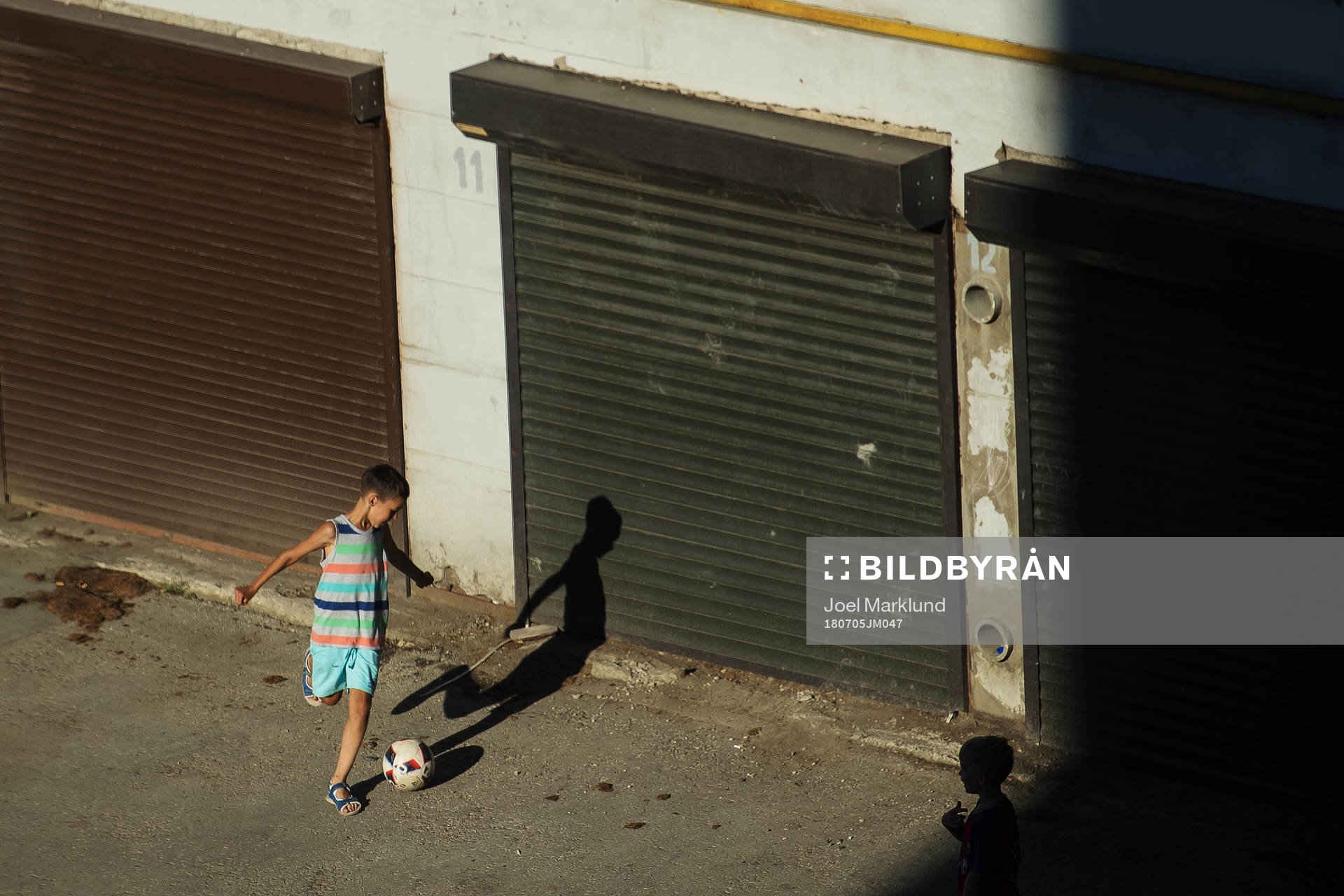 Kids play football