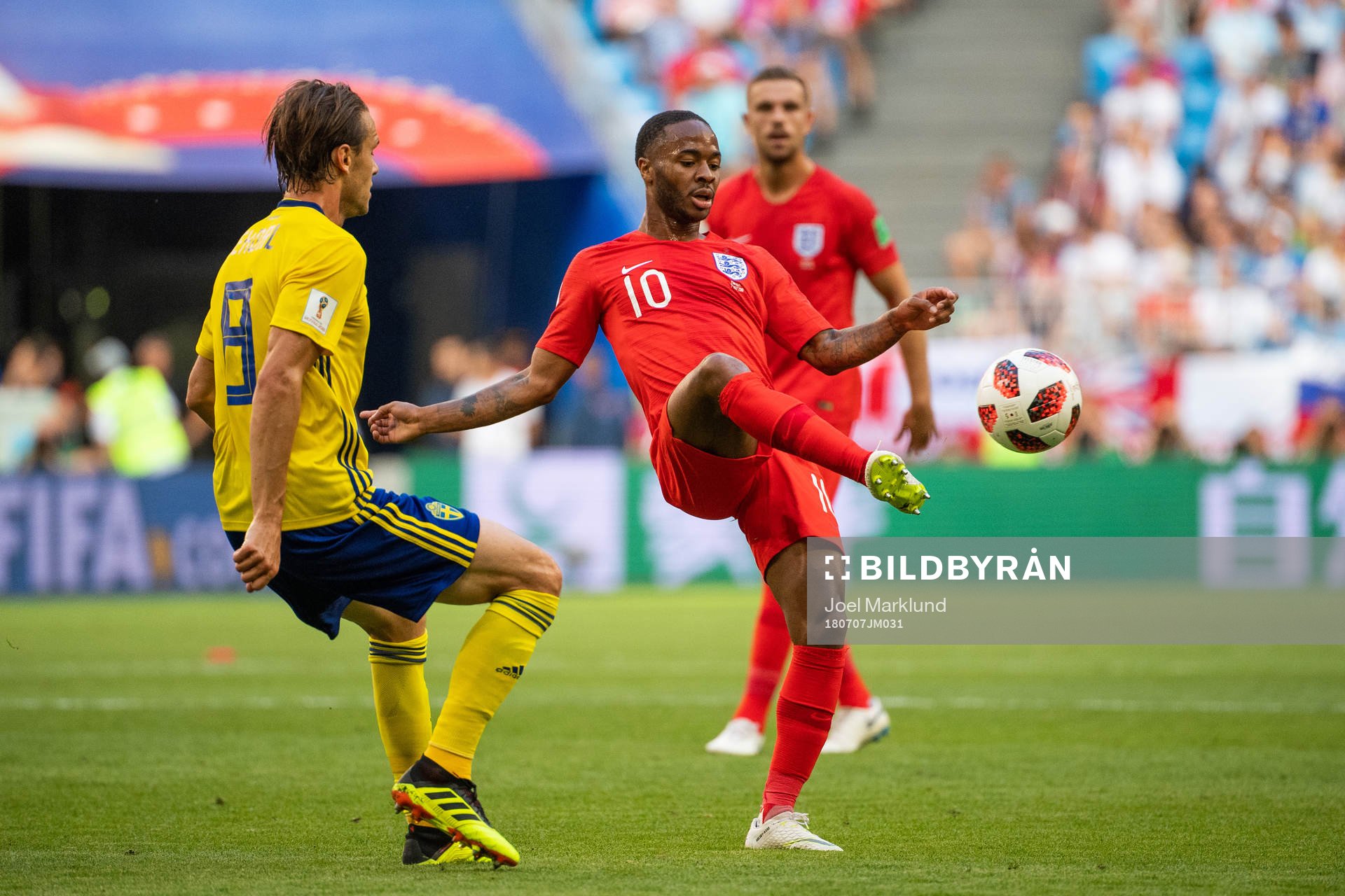 Albin Ekdal of Sweden and Raheem Sterling of England