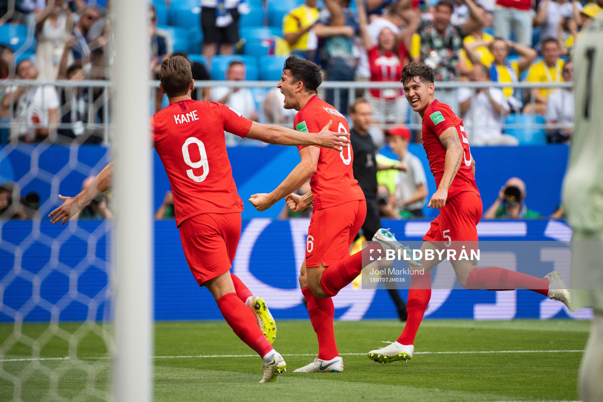 Harry Kane, Harry Maguire and John Stones celebrates