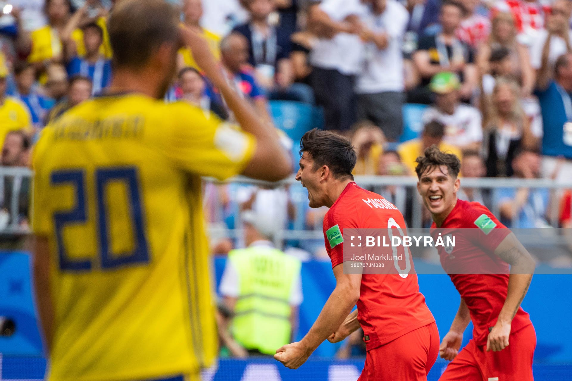 Ola Toivonen of Sweden looks dejected while Harry Maguire