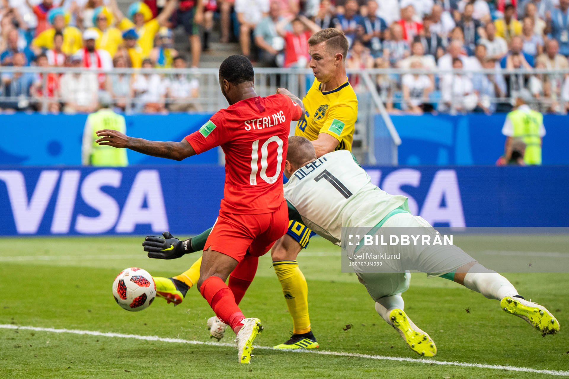 Emil Krafth and goalkeeper Robin Olsen of Sweden saves a