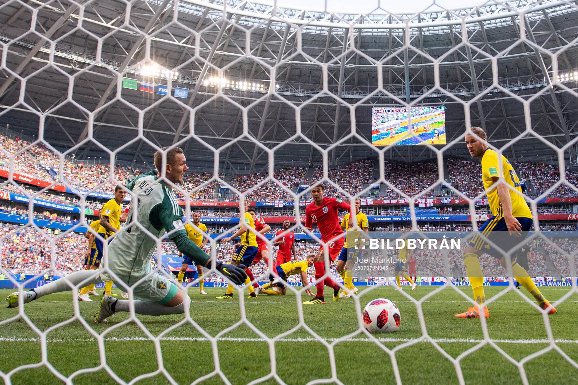 Goalkeeper Robin Olsen and Ola Toivonen watches as Harry