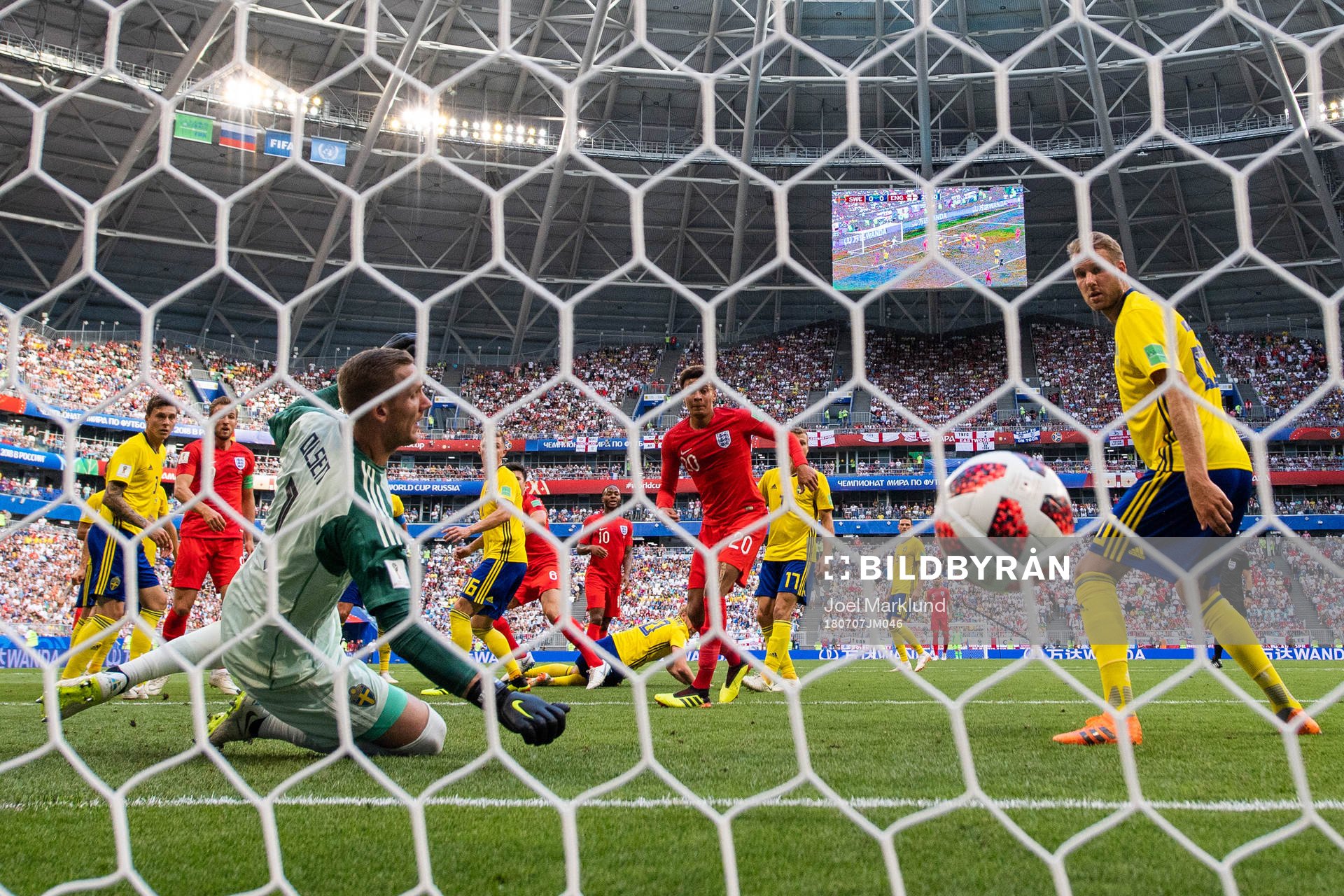 Goalkeeper Robin Olsen and Ola Toivonen watches as Harry