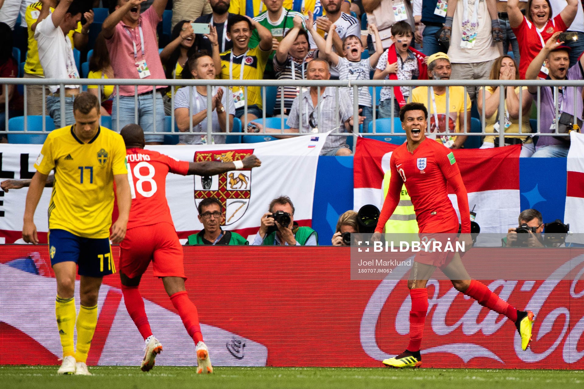 Dele Alli of England celebrates scoring 0-2
