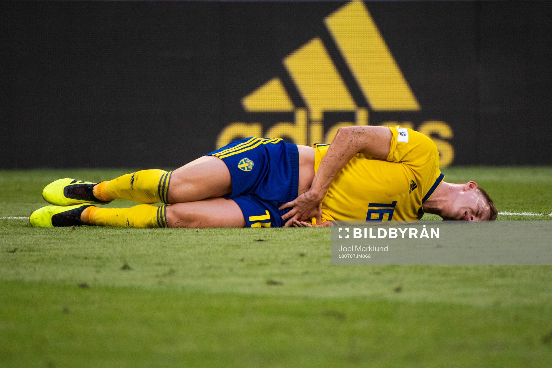 Emil Krafth of Sweden lies down