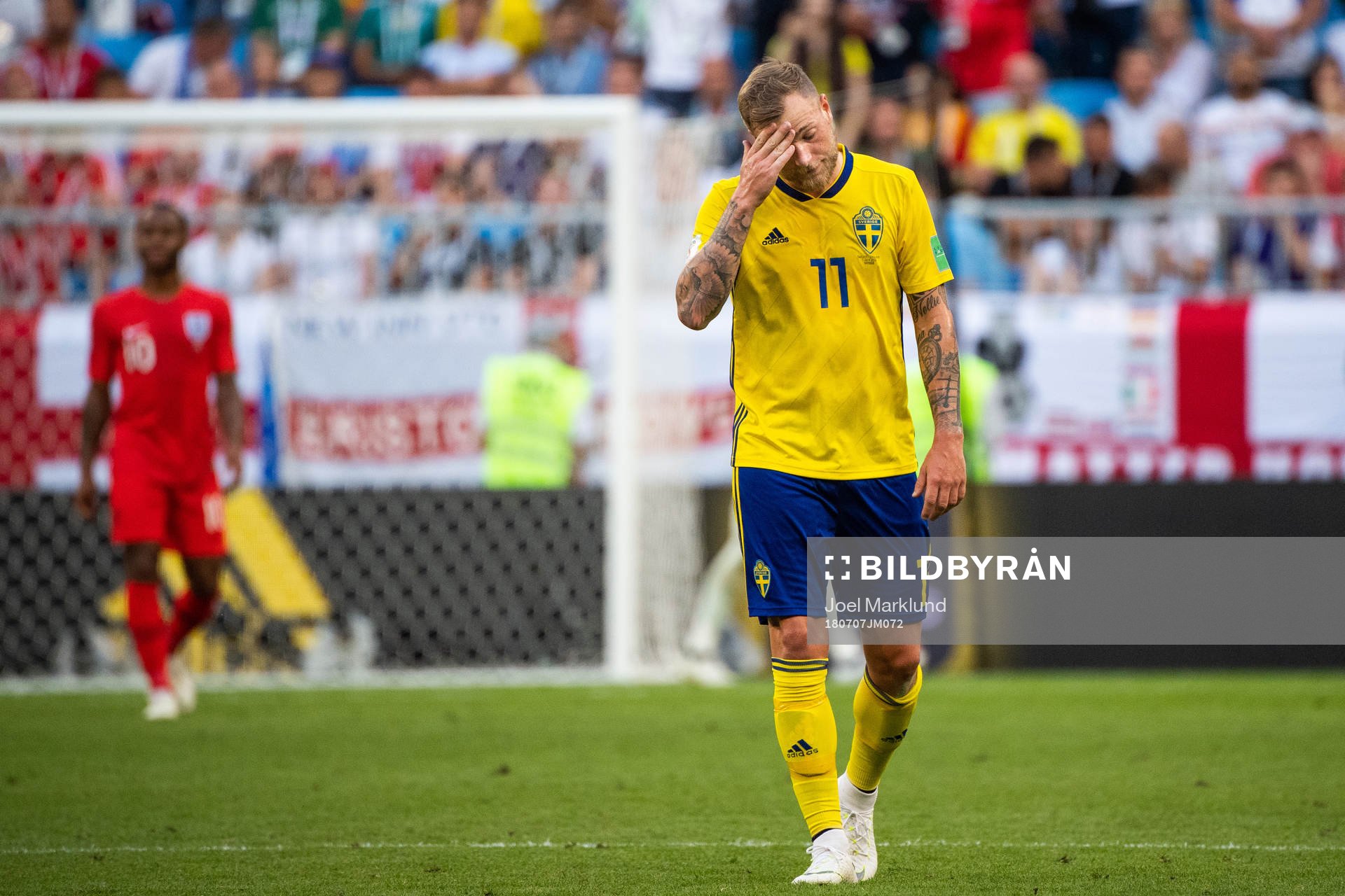 John Guidetti of Sweden looks dejected