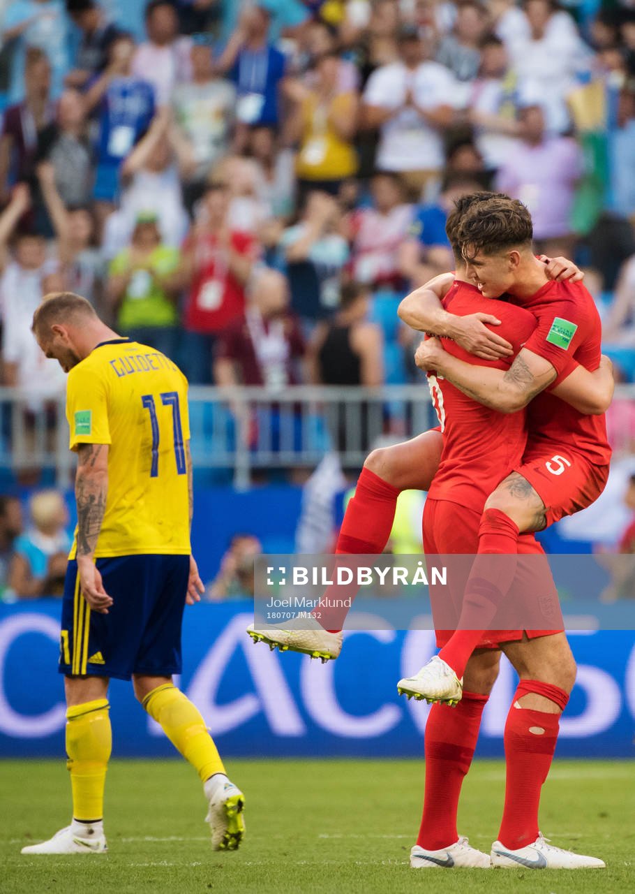 John Guidetti of Sweden look dejected while Harry Maguire