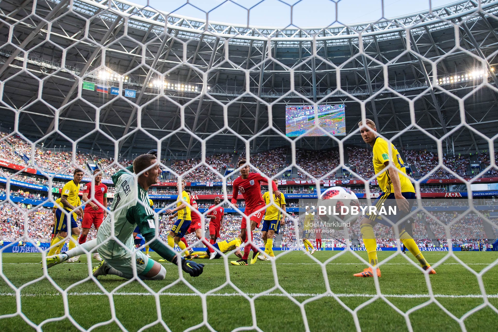 Harry Maguire of England scores 0-1 behind goalkeeper Robin