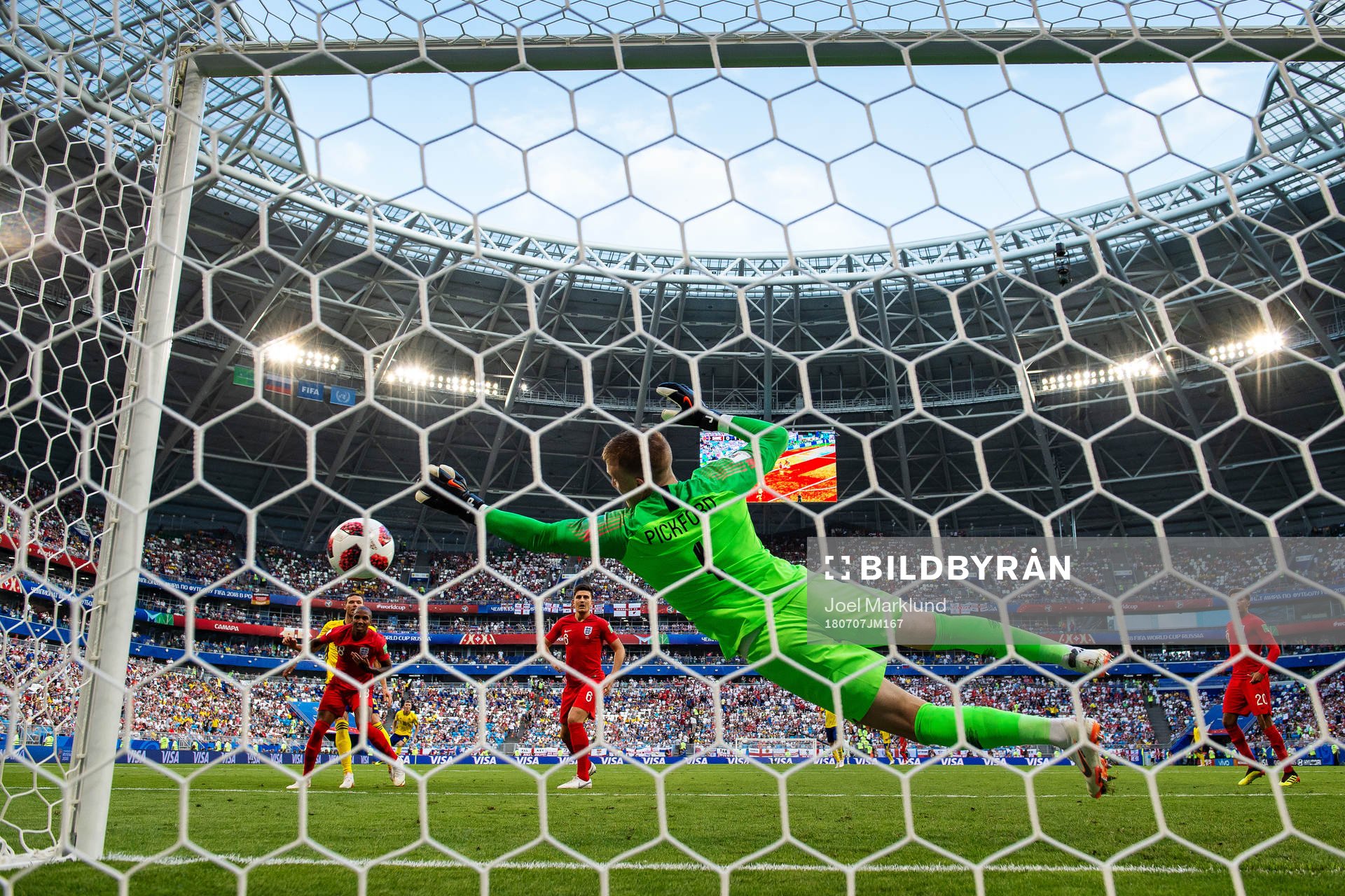 Goalkeeper Jordan Pickford of England saves a shot from