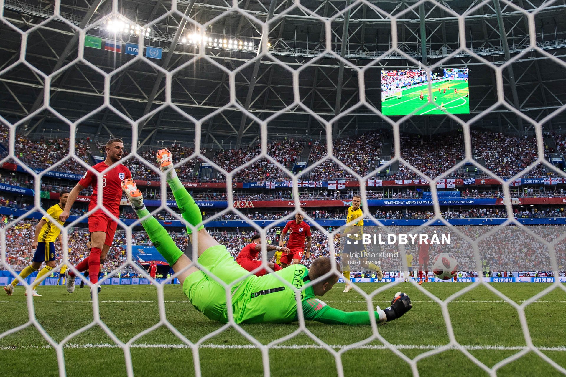 Goalkeeper Jordan Pickford of England saves a shot from