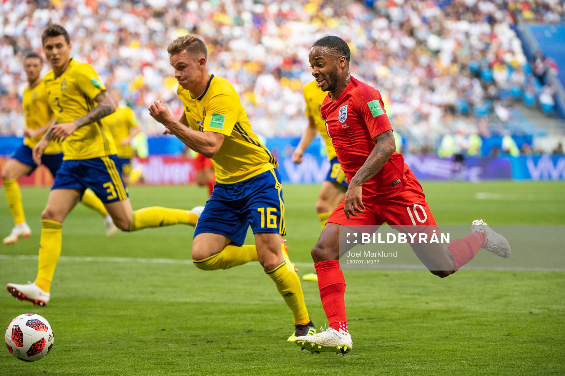 Emil Krafth of Sweden and Raheem Sterling of England