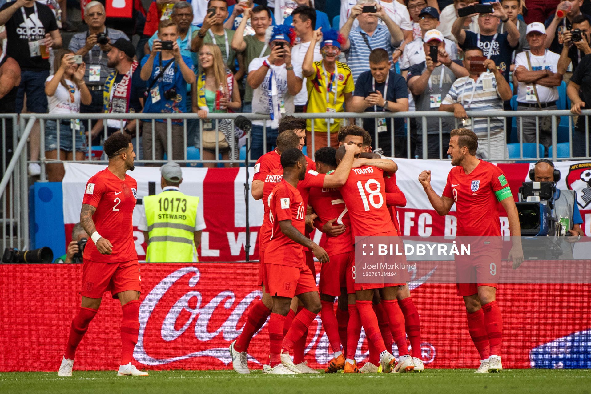 Dele Alli of England celebrates with team mates
