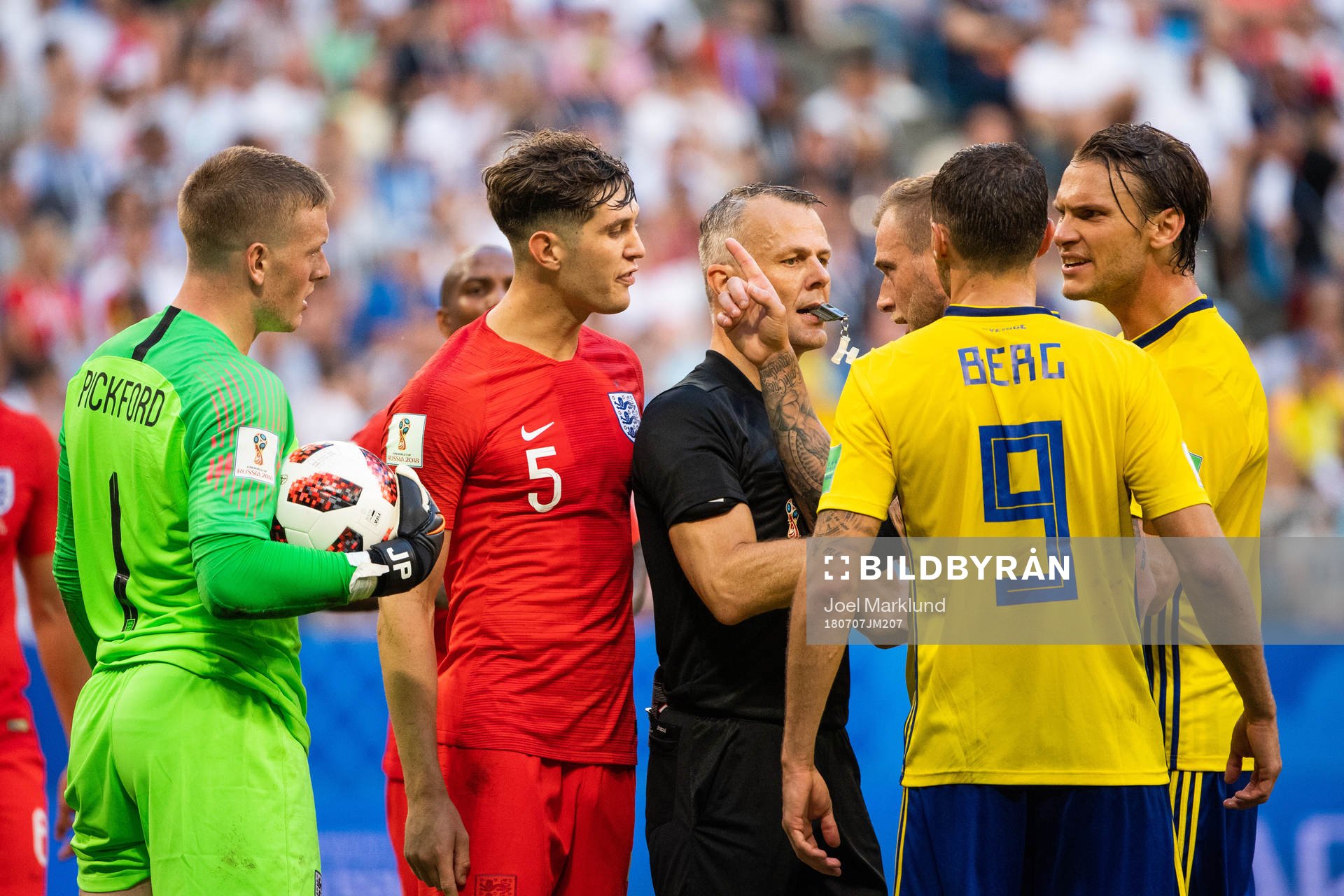 Marcus Berg and Albin Ekdal of Sweden in a discussion with