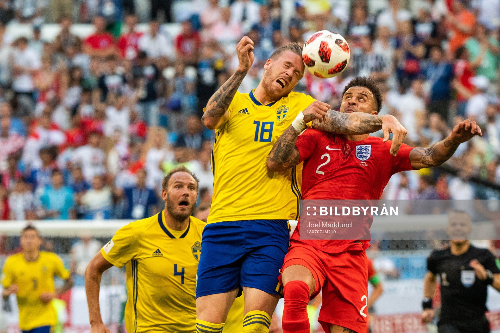 Pontus Jansson of Sweden competes for the ballwith Kyle