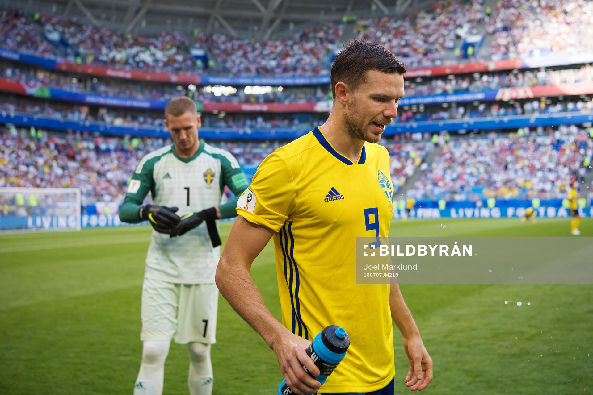 Goalkeeper Robin Olsen and Marcus Berg of Sweden