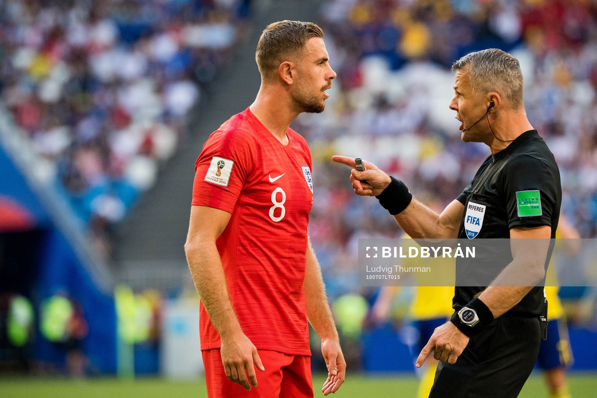 Albin Ekdal of Sweden and the referee