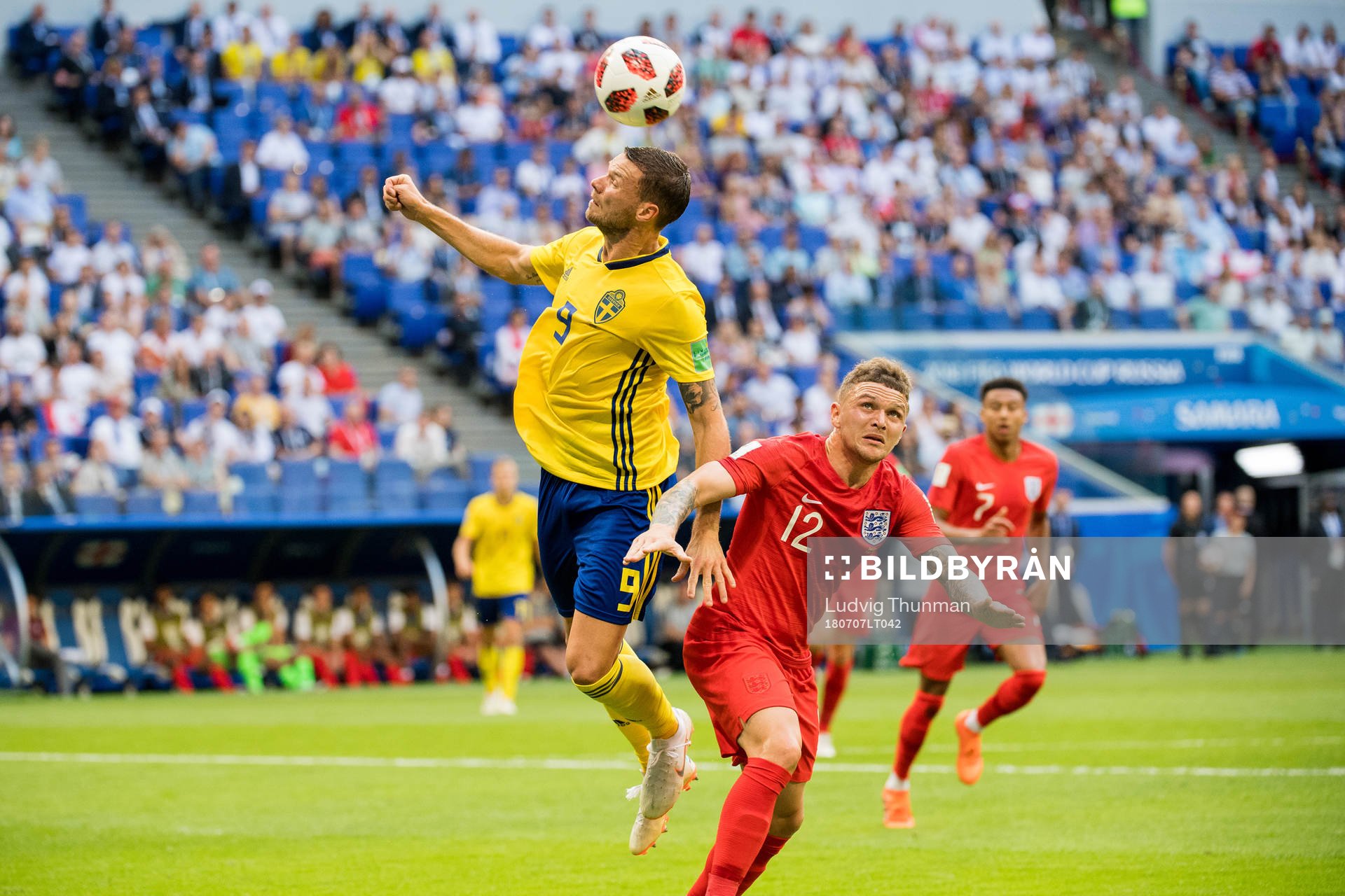 Marcus Berg of Sweden and Kieran Trippier of England