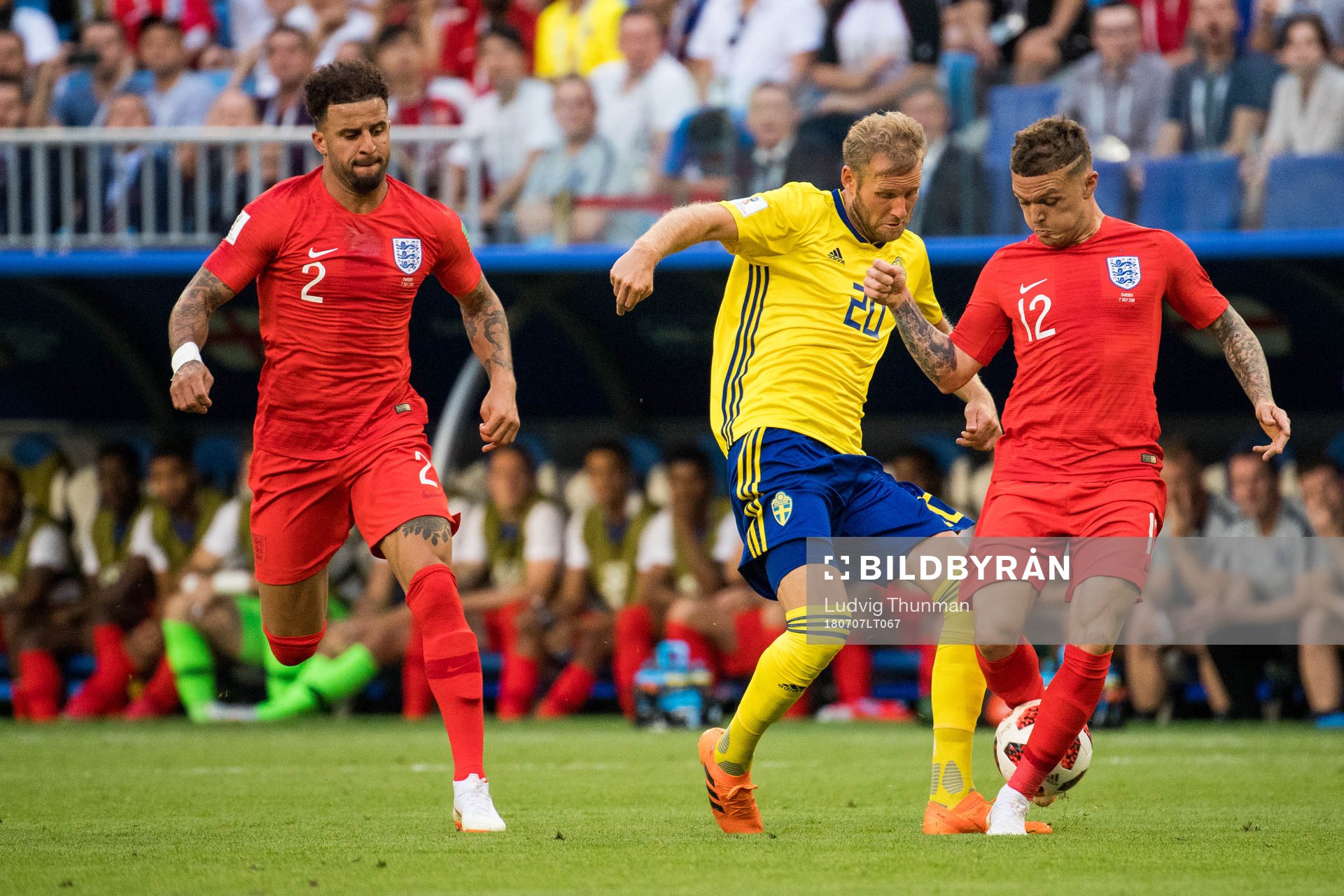 Kyle Walker of England, Ola Toivonen of Sweden and Kieran