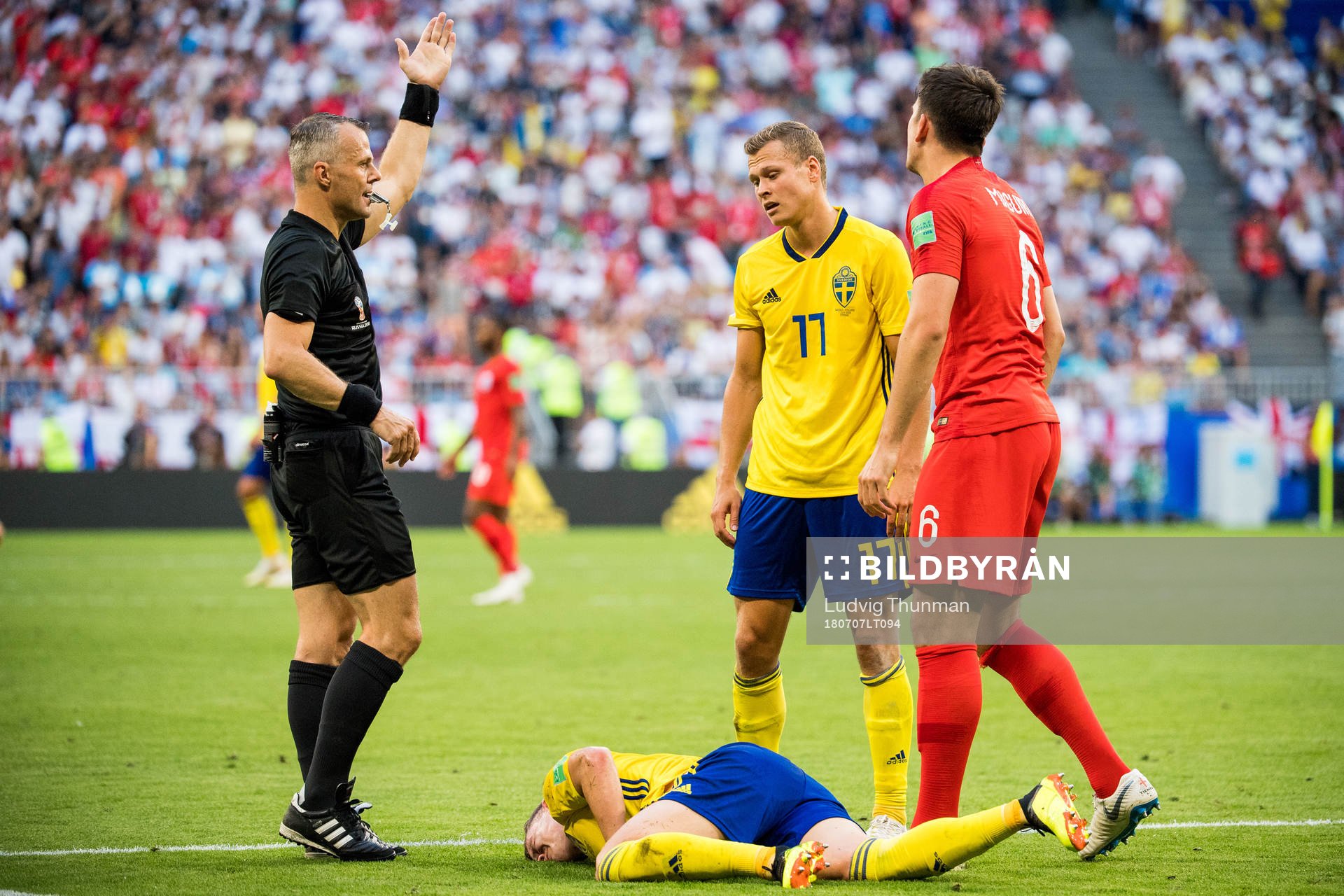 Emil Krafth of Sweden with an injury