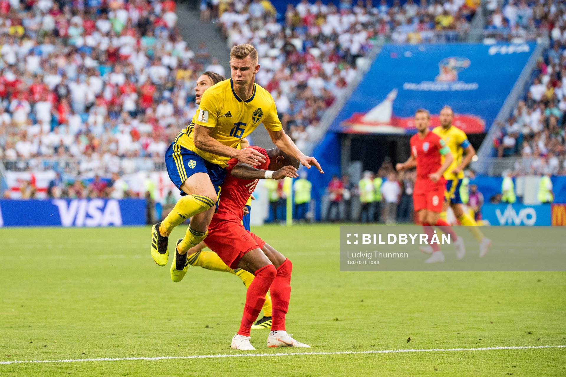 Emil Krafth of Sweden and Ashley Young of England
